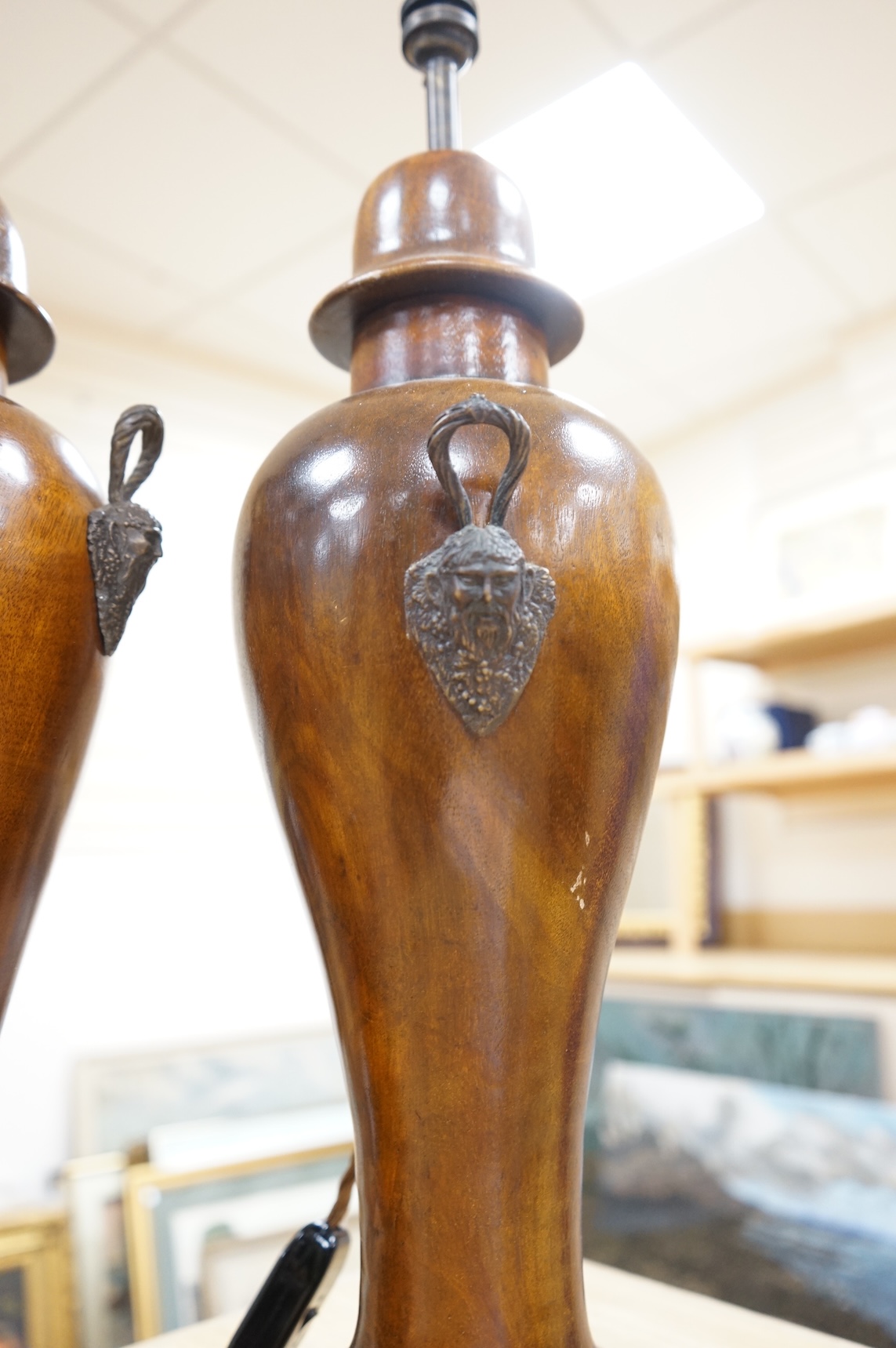 A pair of turned mahogany lamp bases - without shades H 60cm x W 18